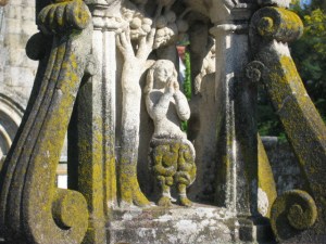 Adam following his expulsion from Paradise, as represented on the base of the Cruceiro de Hío.