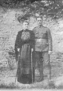 Photo of Forrest Beauchamp – Forrest Beauchamp and his mother (circa June 1916) taken at Foxleigh, Saskatchewan. Copyright/source: http://www.veterans.gc.ca 